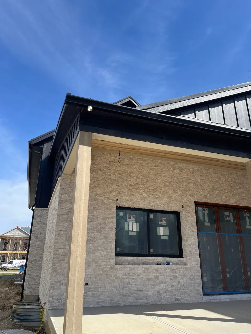 Tarping and dry-in on a Coverdale commercial roof